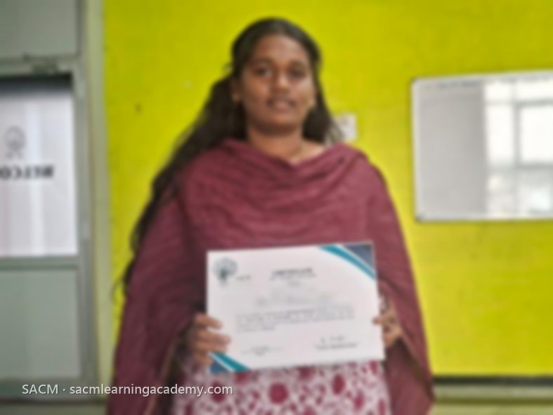 SACM student receiving a certificate of completion from her trainer